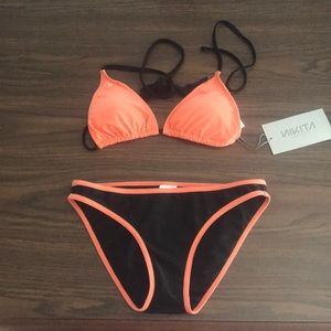 Brand new tags on swimsuit